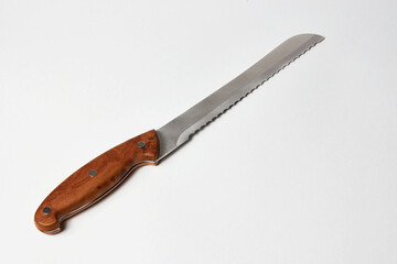 Bread knife on white background with copy space