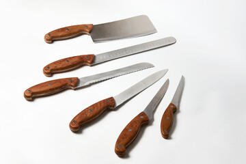 Kitchen knives on white background. Set of steel knives