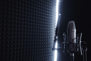 recording studio with microphone on neon acoustic foam rubber