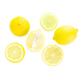 Whole and half lemons on white background 