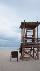 Old wooden beach chair in an Arab coast