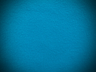Felt  light blue soft rough textile material background texture close up,poker table,tennis ball,table cloth. Empty light blue fabric background.