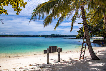 Beautiful tropical island koh Kham, white sand beach with volcanic rocks, near koh Mak, Trat, Thailand