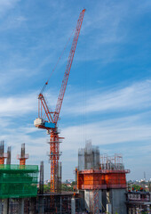 Tower crane in the construction site of a condominium building.