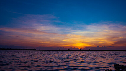 sunset at the beach with amazing sky