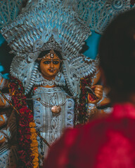 A lady praying to goddess durga

