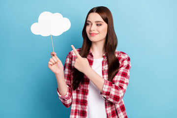 Photo of nice young brunette hair lady point cloud wear red shirt isolated on blue color background