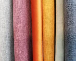 fabrics of different colors in the foreground