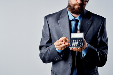 emotional man calculator bitcoin in hand counting finance studio official