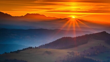 Widok Tatr z Pienin o zachodzie słońca © Michal45