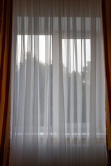 white curtains with a view and windows