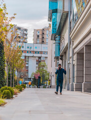 Handsome businessman with style at urban place