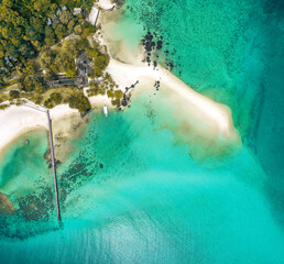 Beautiful tropical island koh Kham, white sand beach with volcanic rocks, near koh Mak, Trat, Thailand