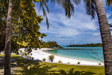 Beautiful tropical island koh Kham, white sand beach with volcanic rocks, near koh Mak, Trat, Thailand