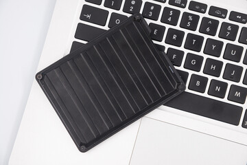 An external USB hard disk drive isolated on a white background. External Hdd drives and flash drives. External hard disk drive for connect to laptop, transfer or backup data between computer and HDD.