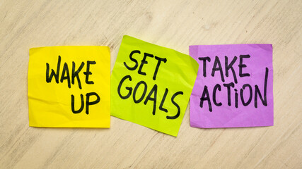 wake up, set goals, take action - a set of motivational reminder notes, business or personal development concept