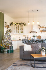 Modern Kitchen Interior with Island, Sink, Cabinets in New Luxury Home Decorated in Christmas Style