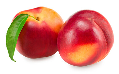Nectarine with green leaf isolated on white background. clipping path