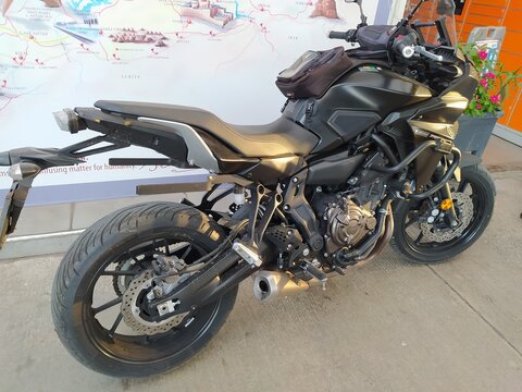 Goynuk, Antalya, Turkey - May 11, 2021: Close up of the engine of a Yamaha MT-07 motorcycle in black at Goynuk, Antalya, Turkey