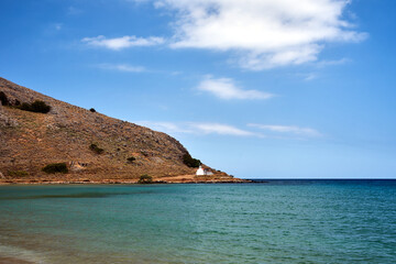 Naklejka premium A white Orthodox chapel on the stone coast of Georgioupoli on the island of Crete
