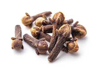 Dry cloves on white background. Pile of spice cloves macro close-up.