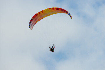 Paraglider Flying in the Sky - 467005117