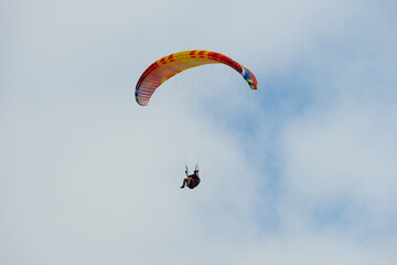 Paraglider Flying in the Sky - 467005143