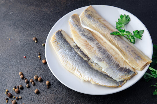 herring fish fillet fresh seafood meal snack on the table copy space food background rustic 