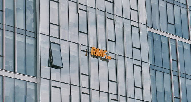 Gdansk, Poland, Europe 10.28.2021. RMF FM on the facade of corporate office buildings located in Polish Gdansk headquarters. Logo of the RMF FM on the office building. 