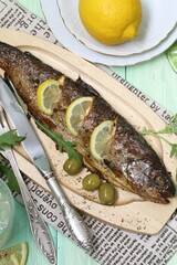 Baked trout in Italian herbs with lemon and olives