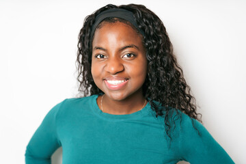 Young African Woman smiling on White Background