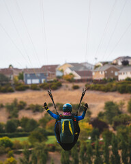 Paraglider Pilot Flying in the Sky - 467008778