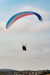 Paraglider Pilot Flying in the Sky