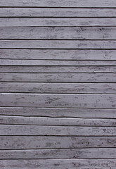Old wooden wall plank texture in white old paint. Wooden texture of an old church.