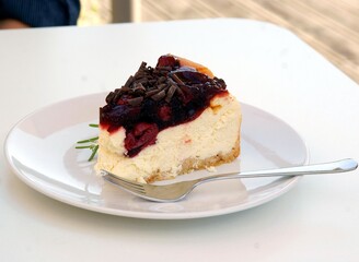 cheese cake with cherry jam close up
