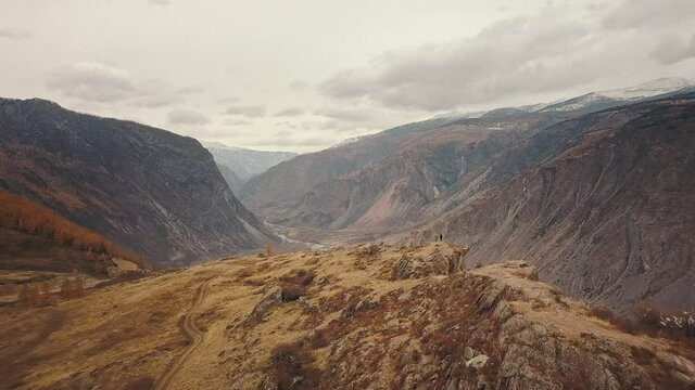 Katu Yaryk mountain pass in the valley of the Chulyshman River, Altai, Siberia, Russia. A huge stone gorge, a canyon, a mountain winding river, a dangerous serpentine highway. Freedom, loneliness
