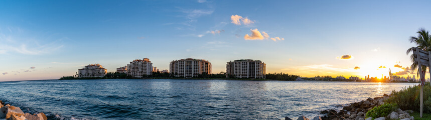Aerial panorama view of Miami beach bayfront scene at sunset