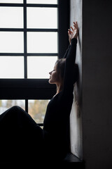 Ballet dancer on the black background