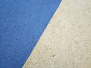 Colorful playground background. Grey-blue rubber outdoor playground