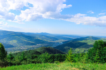 Fototapeta na wymiar View from Mount Makovitsa in Western Ukraine. Landscape on mountains and forests. Ukraine, Yaremche
