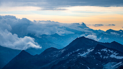 Rocky alpine mountains morning panorama