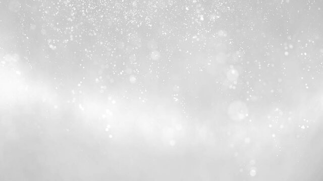 Seamless loop winter glittering snowflakes copy space animation background. Conceptual Winter season.