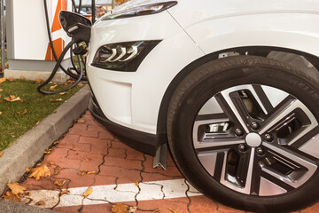 open charger of electric car with green licence plate