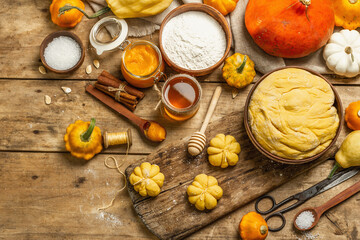 Pumpkin buns or biscuits, traditional fall baked goods. Seasonal ingredients for cooking food