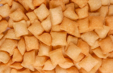 Brazilian snacks in close-up forming a background.
