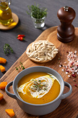 Pumpkin and carrot soup with cream