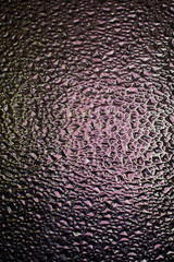dark pink bokeh defocused background drop texture on glass