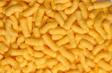 Brazilian snacks in close-up forming a background.