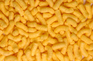 Brazilian snacks in close-up forming a background.