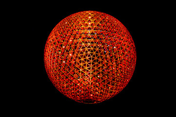 red crystal ball on black background